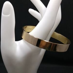 Anne Klein Solid Gold Tone Bangle Bracelet, 7 3/4 Inches, Very Reflective